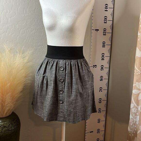 Love Culture wide elastic waistband miniskirt w/ 2 front pockets & faux buttons. - Picture 2 of 8